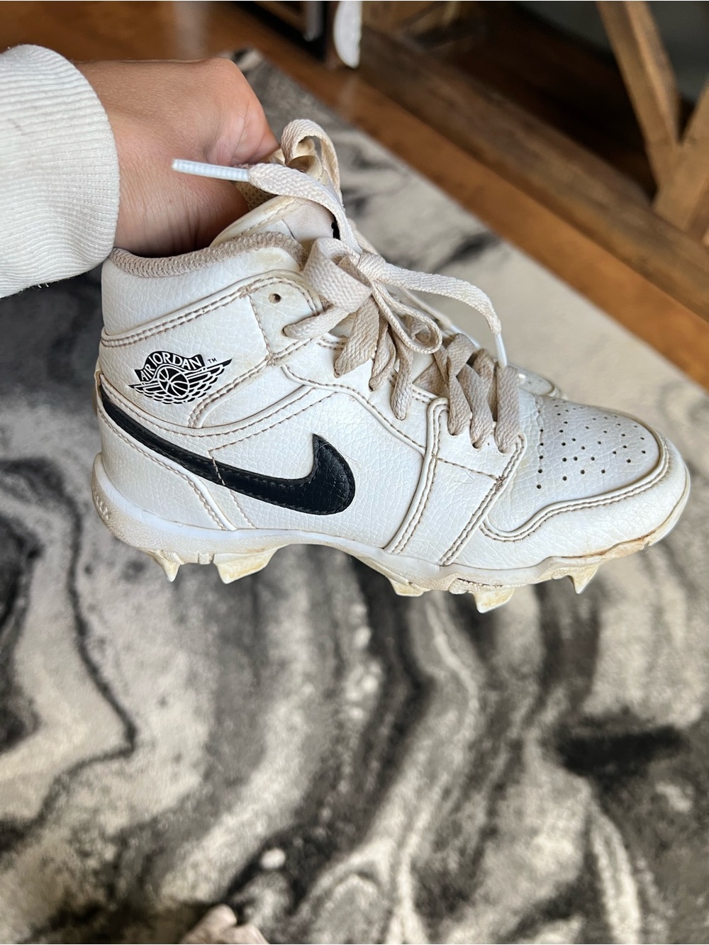 Nike Kids White Baseball Cleat Sneaker with Black Swoosh